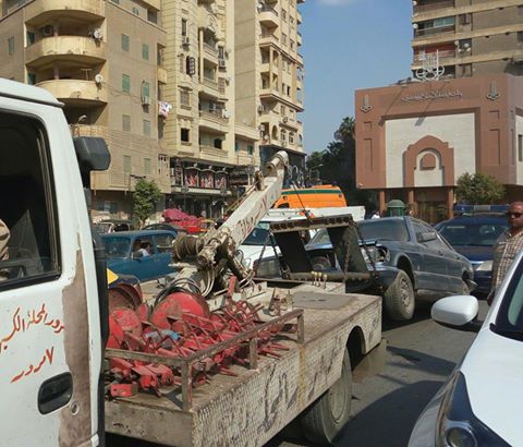 حملة لإعادة الإنضباط المرورى بشوارع المحلة ومنع تجزئة خطوط السير