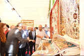 محافظ الفيوم ورئيس جهاز تنمية المشروعات يتفقدان معرض "أثاث دمياط" بنادي قارون الرياضي